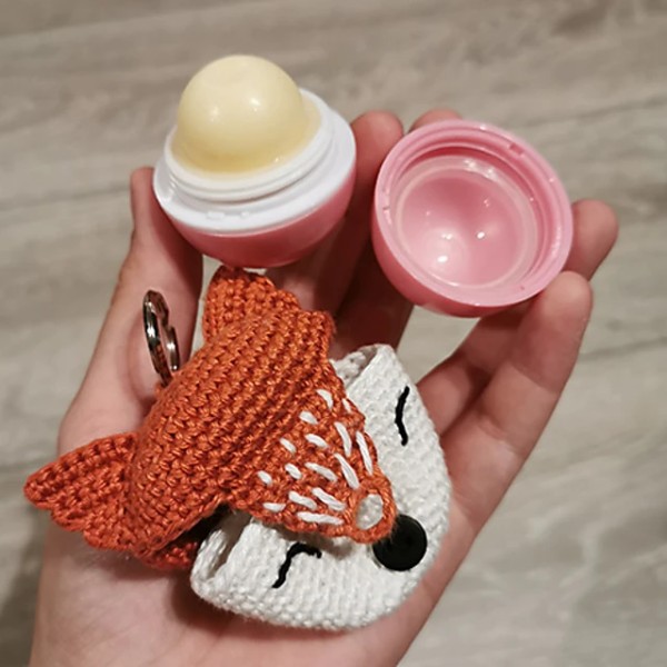 A crochet fox keychain and lip balm.