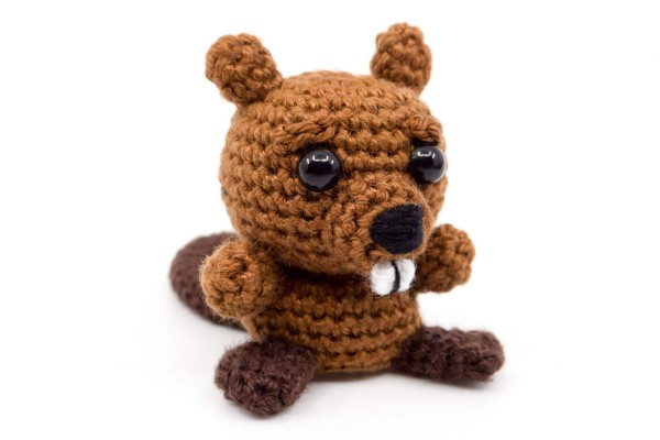 A miniature crochet beaver.