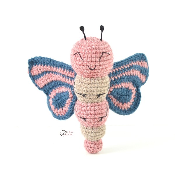 A beautiful crochet butterfly softie toy.
