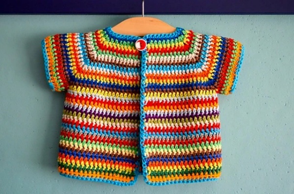 A short-sleeved corchet cardigan with brightly coloured stripes.