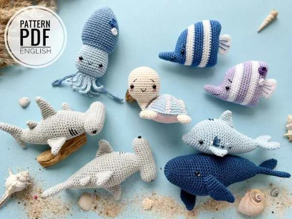 A collection of crochet sea animal amigurumi.