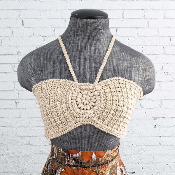 Dummy wearing a crochet bralette.