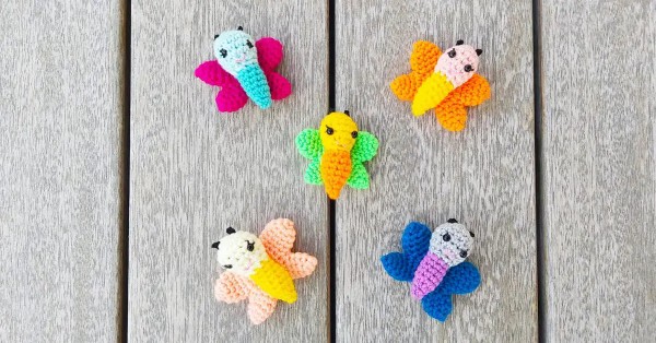 A group of small crochet butterfly amigurumi.
