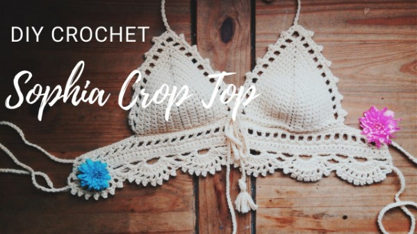 A white crochet bralette with tassels.
