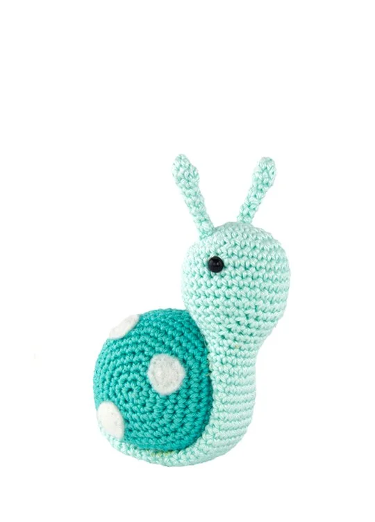 A blue crochet snail with a polka dot shell.