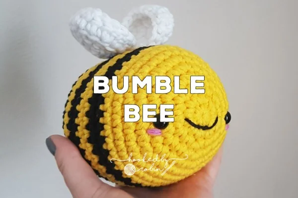 A chubby round crochet bumblebee.