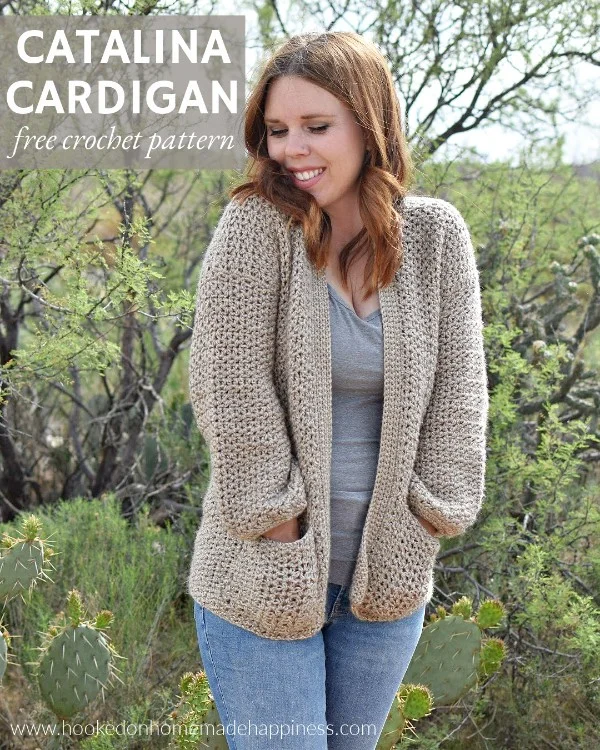A woman outdoors weraing a crochet cardigan.