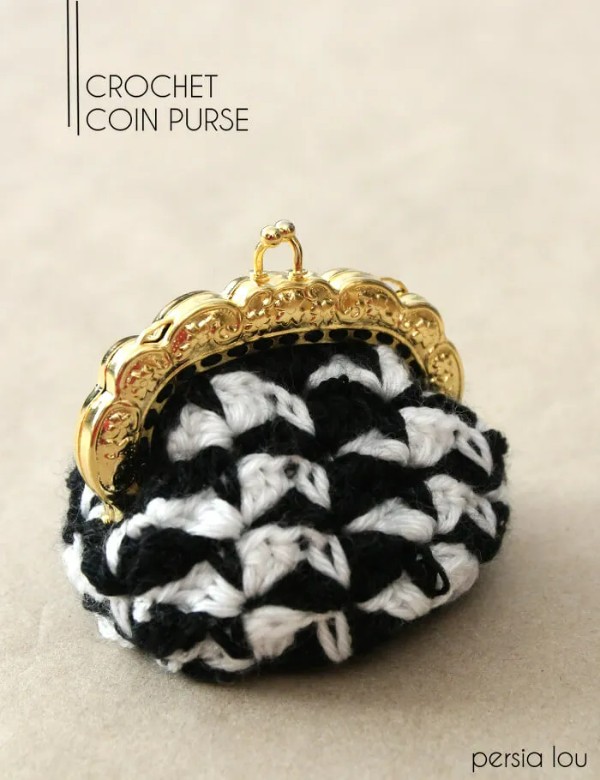 A black and white crochet coin purse.