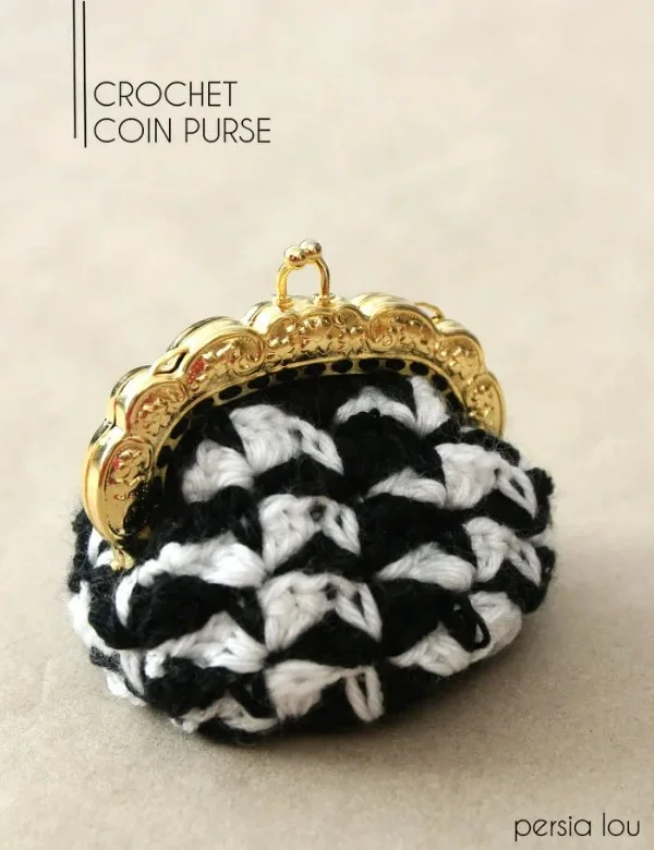 A black and white crochet coin purse.