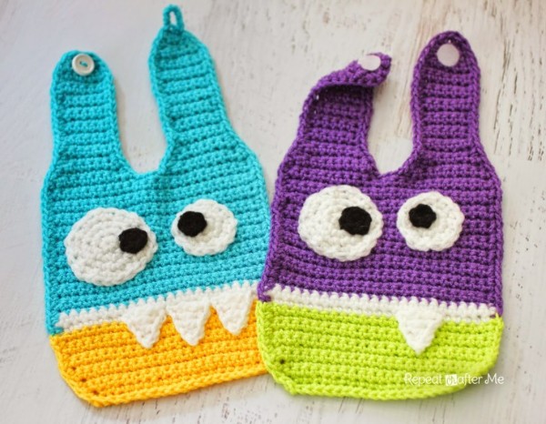 Crochet monster-themed baby bibs.