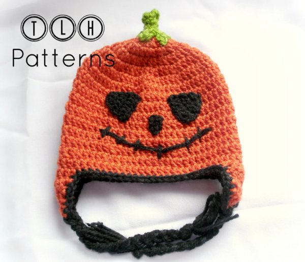 A jack-o-lantern crocht hat on a white background.