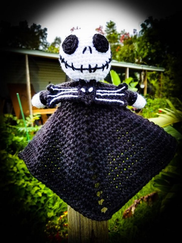 A Jack Skellington Halloween crochet baby lovey.
