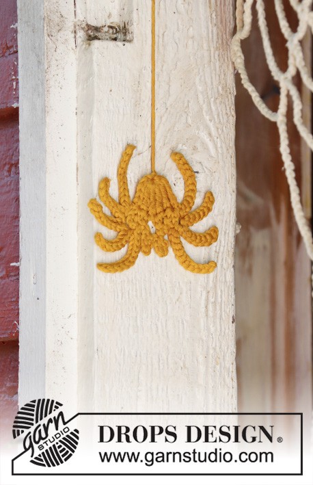 A yellow crochet spider.