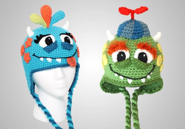 Two brightly coloured crochet monster hats.