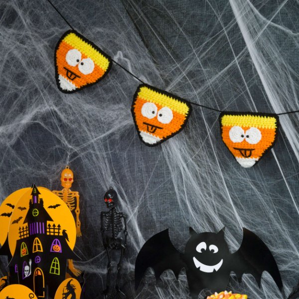 A Halloween crochet candy corn banner.