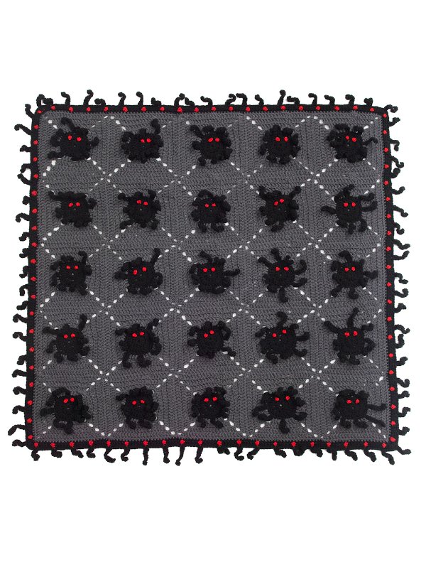 A spider square crochet Halloween blanket.