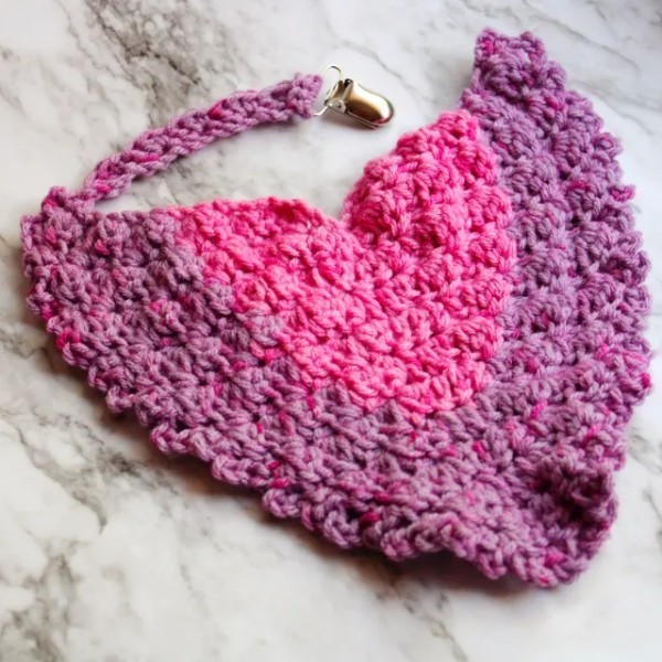 Pink, bandanna-style crochet bib.