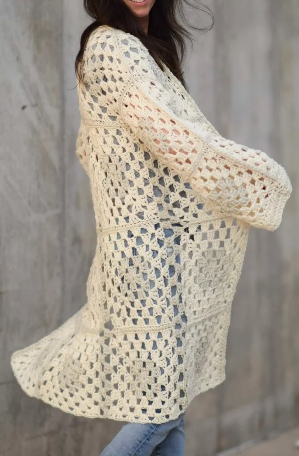 A duster length crochet Granny Square cardigan.