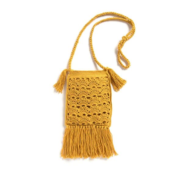 A small, yellow crochet crossbody bag with tassels and fringing.