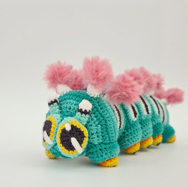 A beautifully detailed, realistic crochet caterpillar.