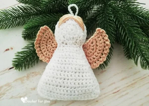 A crochet angel Christmas ornament.