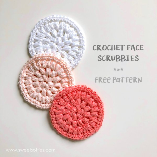 Pink, white and coral coloured crochet scrubbies.