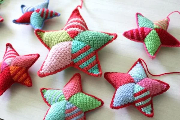 Multicoloured puffy star crochet Christmas tree ornamnents.