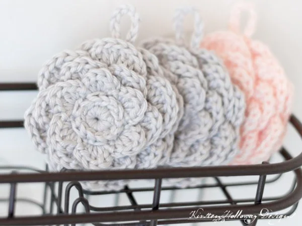 Crochet face scrubbies with multi-layered petals.