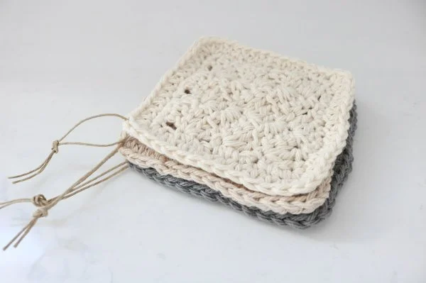 A stack of mini crochet washcloths.