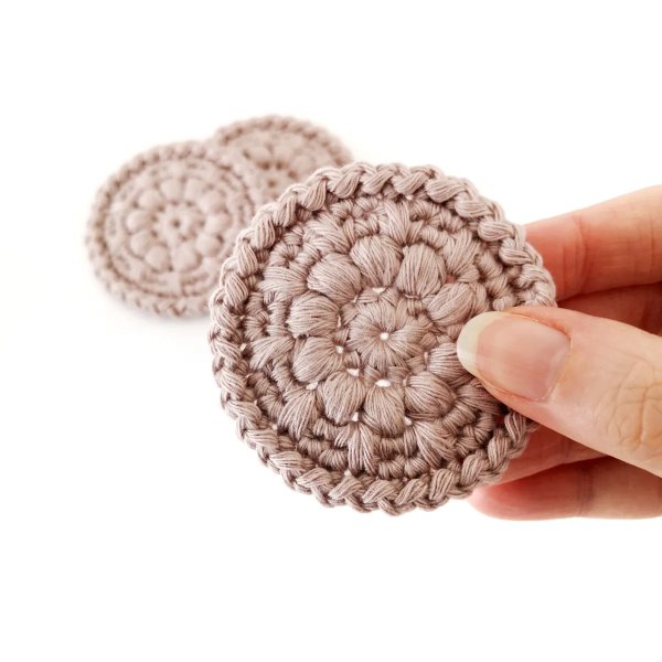 Dusky pink crochet face scrubbies.