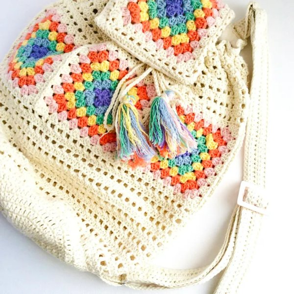 A crochet backpack made with granny squares.