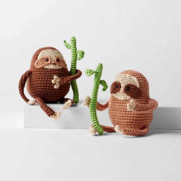 Small crochet sloths with long arms.