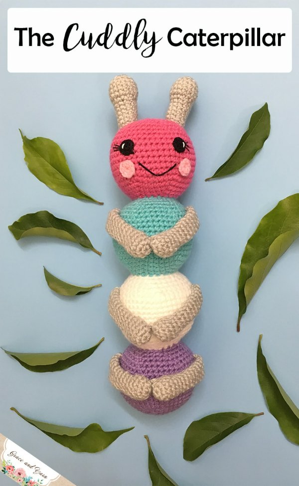 A crochet caterpillar on its back.