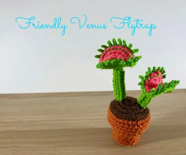 A crocheted venus flytrap.