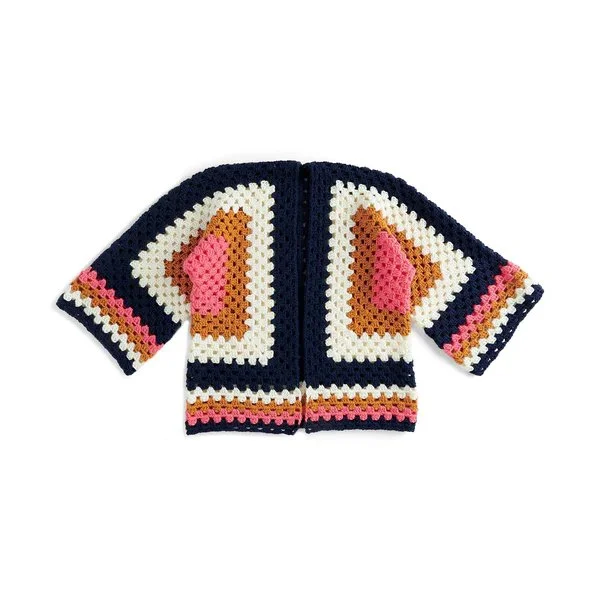 A colour blocked crochet hexagon cardigan on a white background.