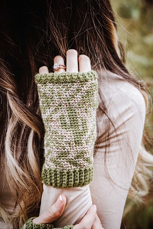 Crochet fingerless mittens with cactus motif colourowrk.