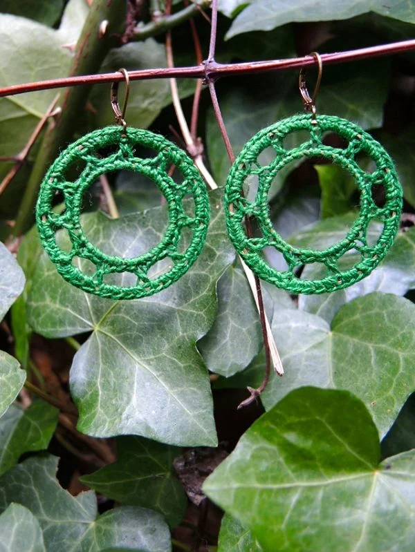 Green crochet hoop earrings.
