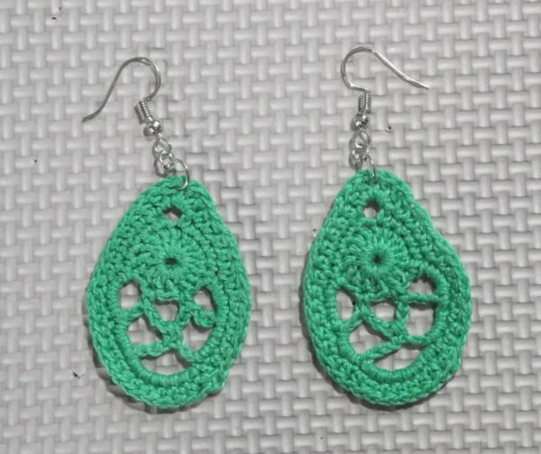 Jade green crochet earrings.
