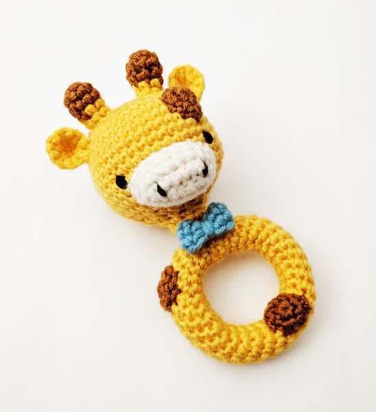 A cute crochet giraffe rattle.
