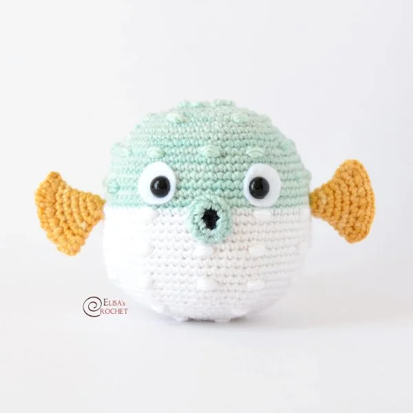 A cute crochet blowfish amigurumi.