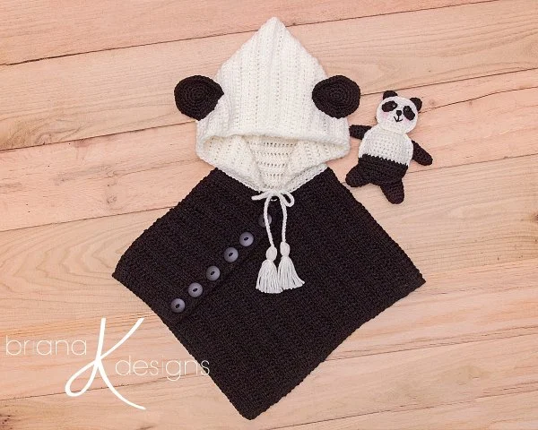 A kids crochet poncho with a panda bear theme.