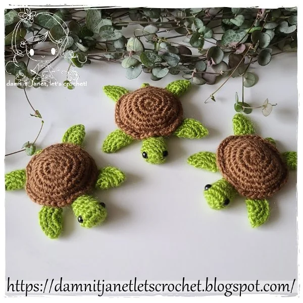 Three mini crochet sea turtles.