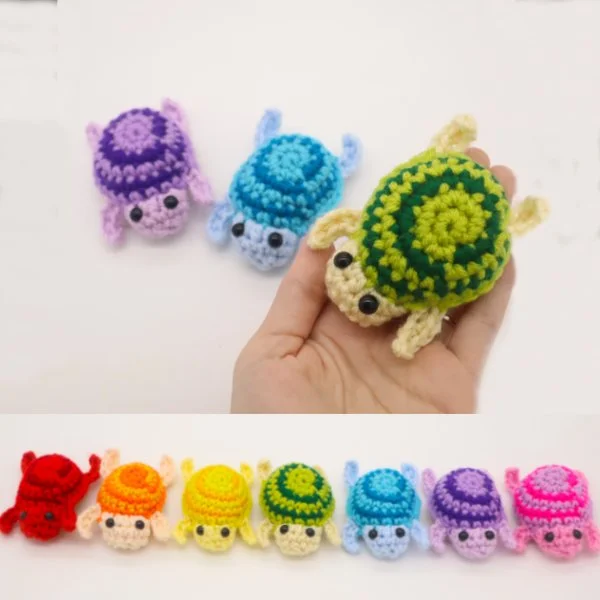 No-sew crochet turtle amigurumi in rainbow colours.