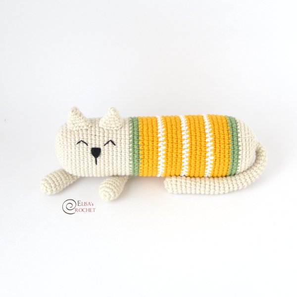 A crochet cat toy laying down.
