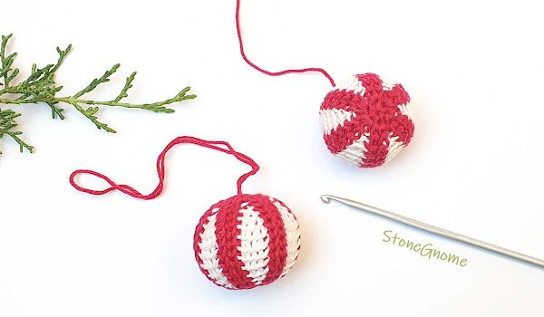 Red and white striped crochet Christmas balls.
