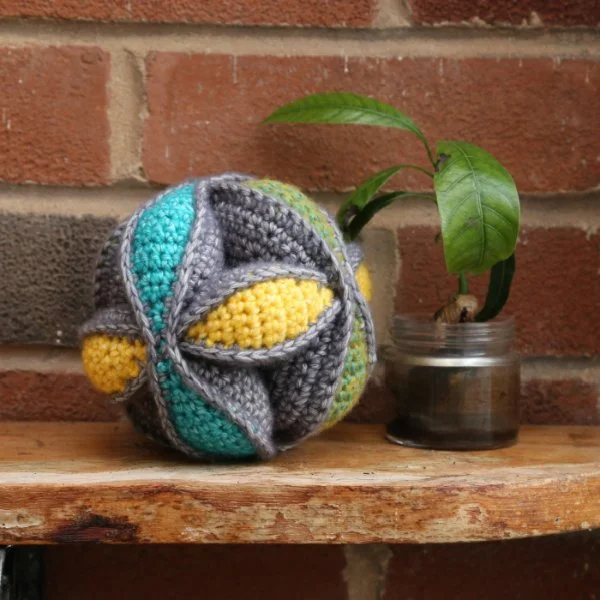 A crochet amish puzzle ball.