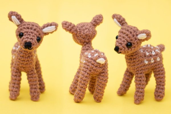 Three tiny crochet fawns.