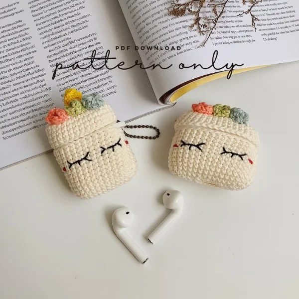 Two cute crochet AirPods cases.