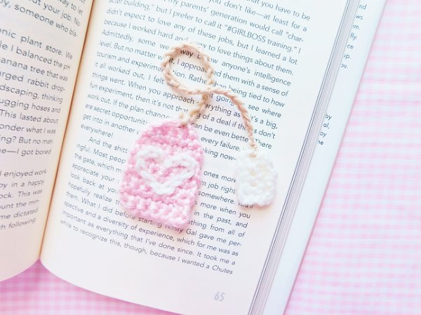 A crochet tea bag bookmark.
