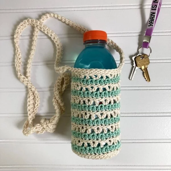 A striped crochet water bottle sling.
